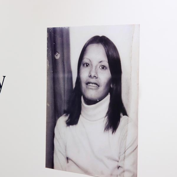 A portrait of Atticus Mercredi's mother beside the exhibit name.